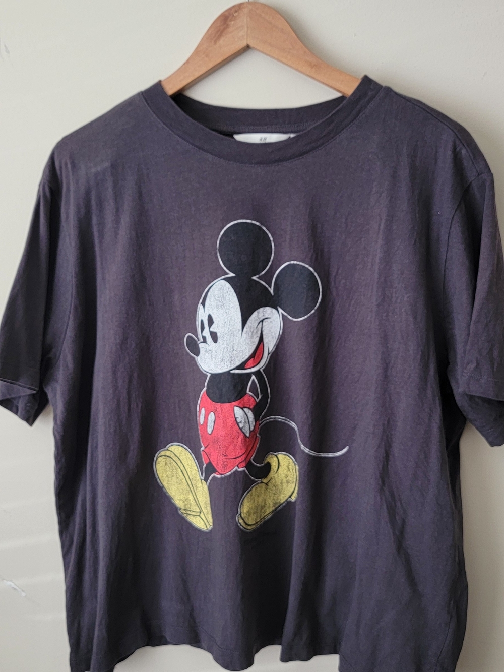 H&M Black Mickey Mouse Graphic Tee with Red & Yellow Accents